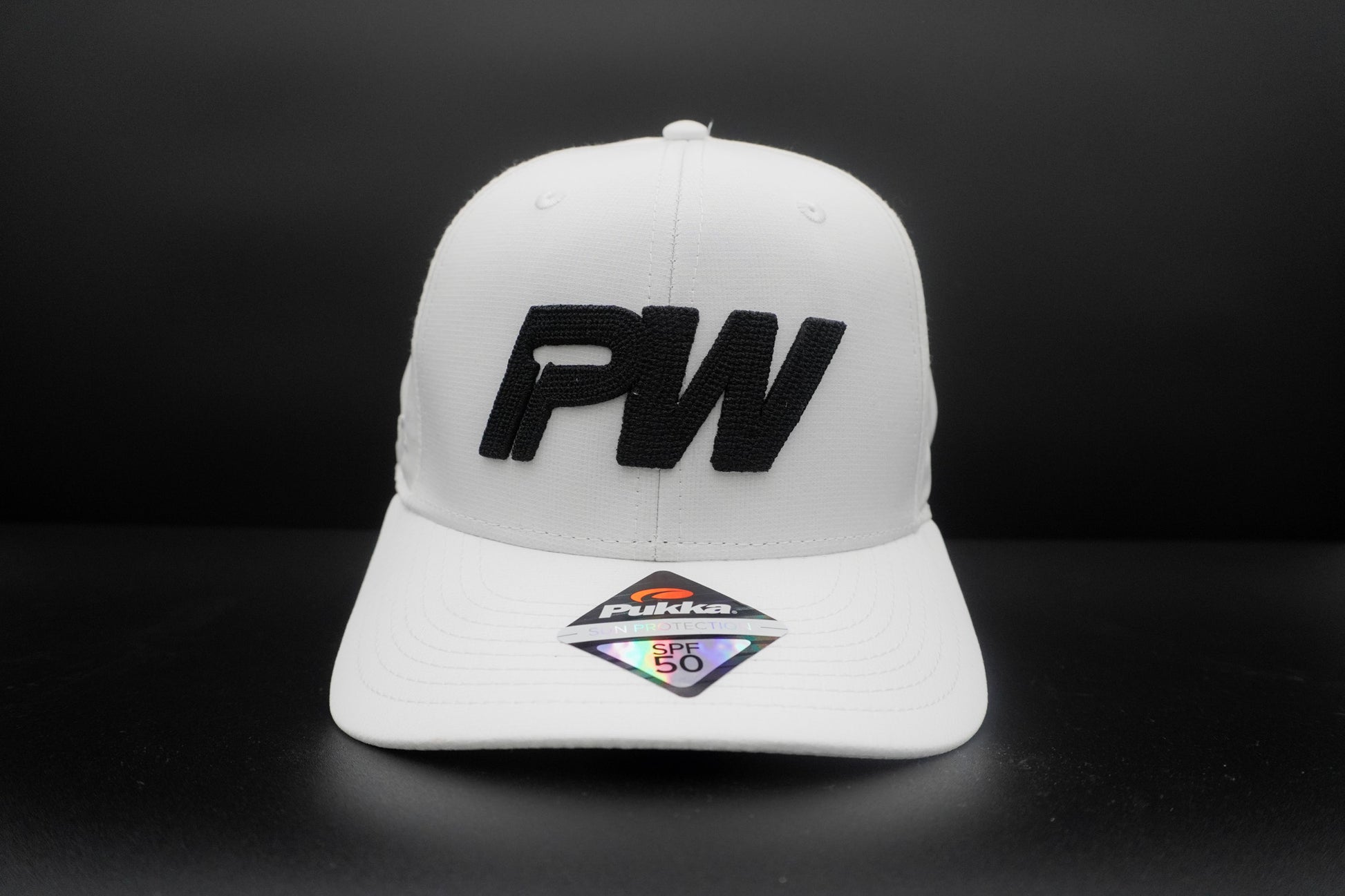 Pukka A-Flex Black Tech Fabric Baseball Cap Orange Logo Stretch Fit Hat S/M NEW Pukka A-Flex Black Tech Fabric Baseball Cap Orange Logo Stretch Fit Hat S/M NEW